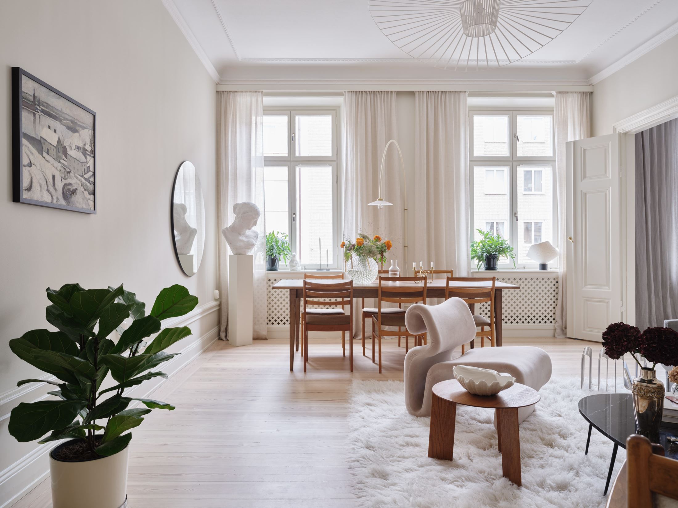 A classy historic apartment with a soft and elegant decor